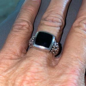 Beautiful sterling silver ring with onyx and intricate details on the band. Sz 7